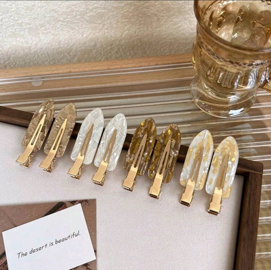 PINZA PARA EL CABELLO